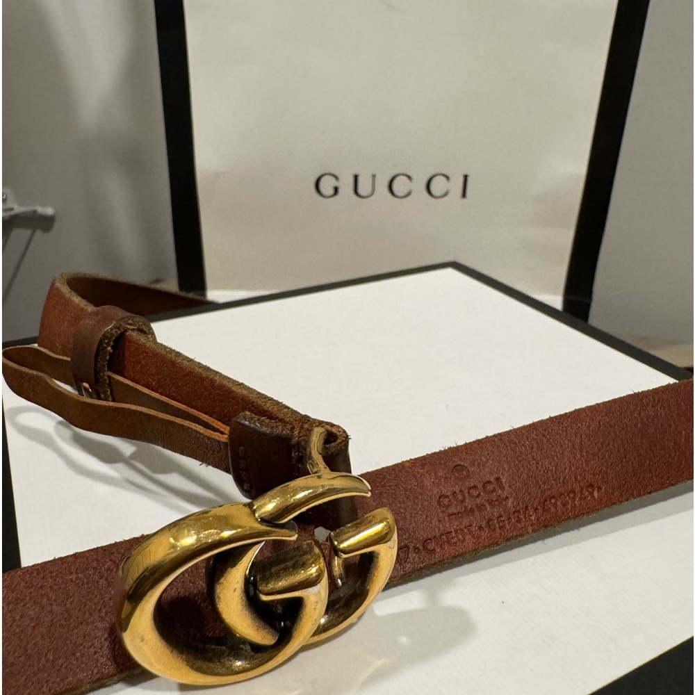 Almost new , genuine leather Gucci belt with box and bag.